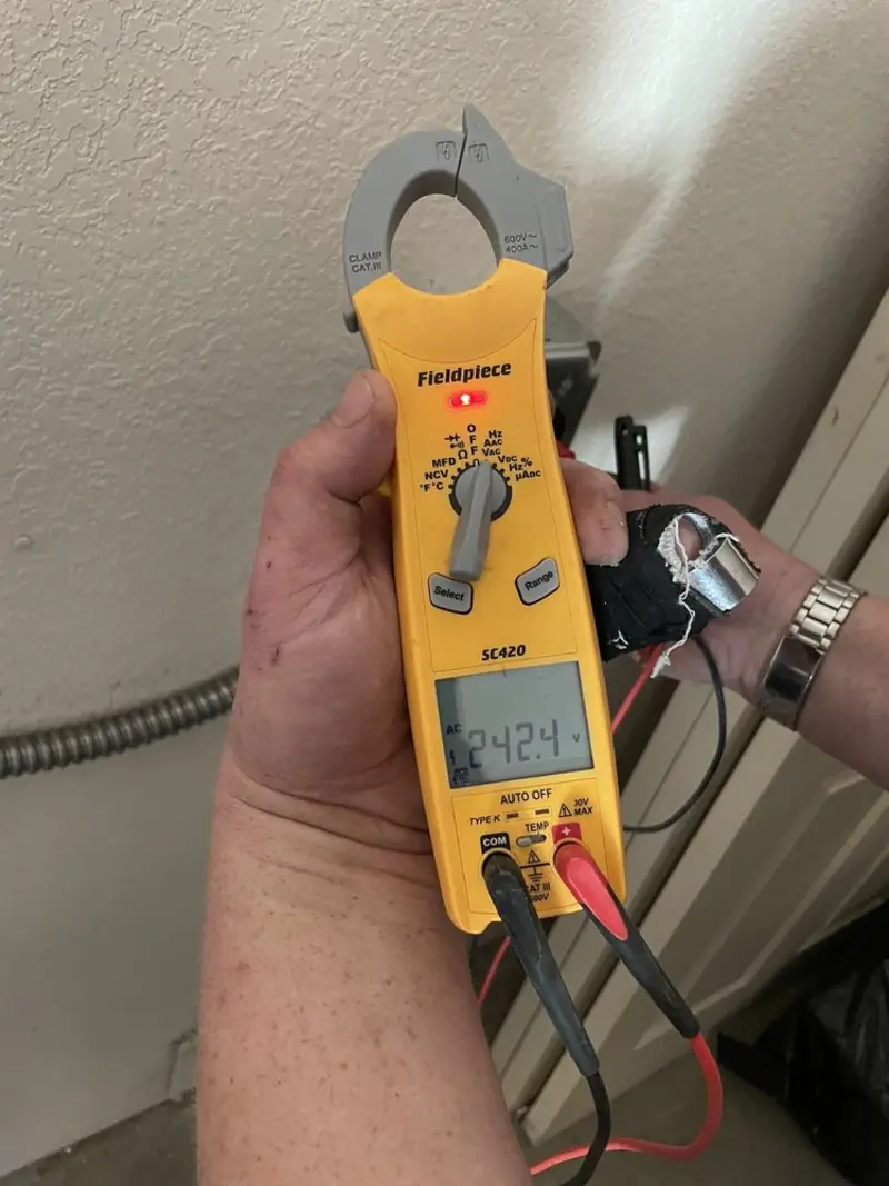 Voltage testing with clamp meter during Generator Installation in Atwater